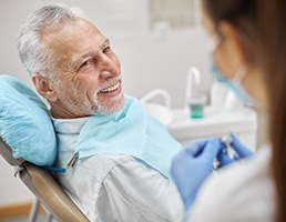 smiling patient sitting in the chair