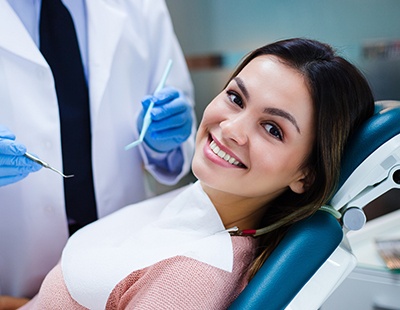 Woman smiling at dental office