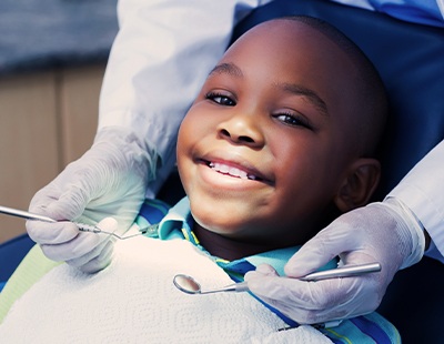 Child receiving dental checkup