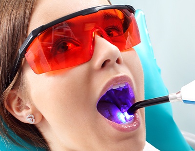 Patient receiving dental sealant