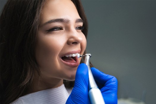 A woman getting a dental cleaning near Glenmont
