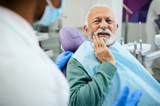 A man with a dental emergency near Glenmont