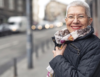 Woman smiling with dental implants in Silver Spring