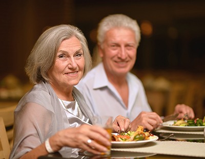 Older couple enjoying a meal together