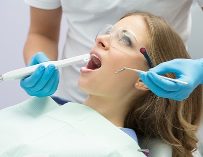 Dentist capturing intraoral images