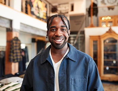 a smiling person after porcelain veneer placement