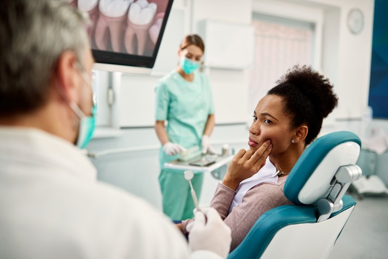 Woman at the dentist with a toothache